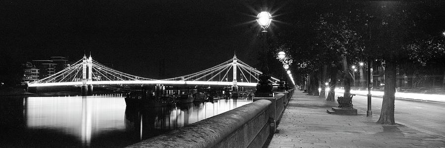 Albert Bridge in London at night Black and white Photograph by Sonny Ryse