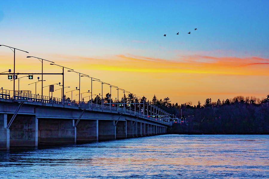 Alexandra bridge entering Quebec at dusk Photograph by Tatiana Travelways