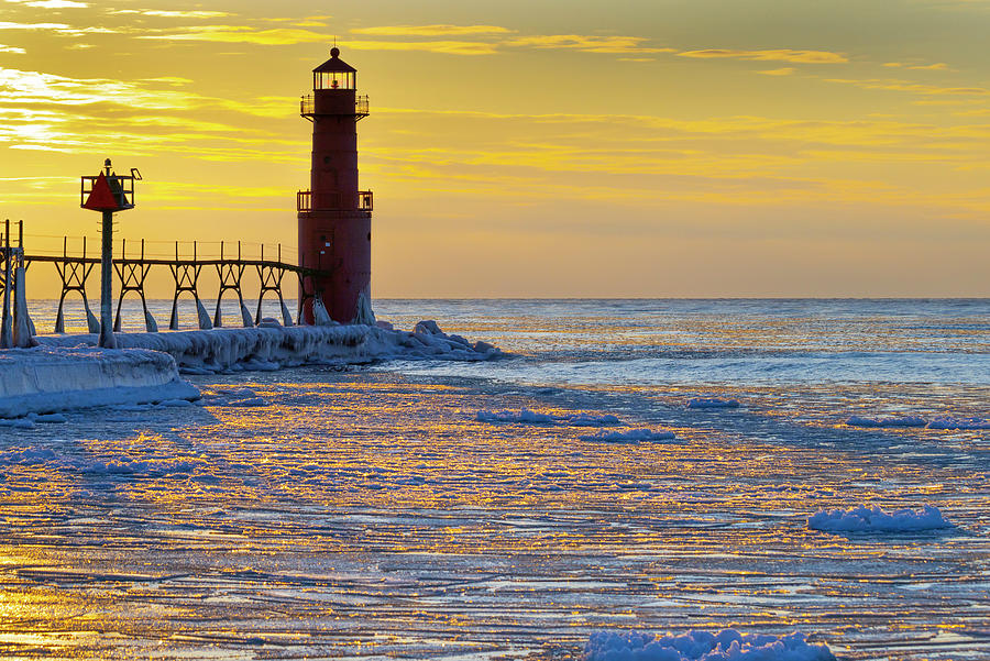 Algoma harbor sunrise with broken ice Photograph by James Brey