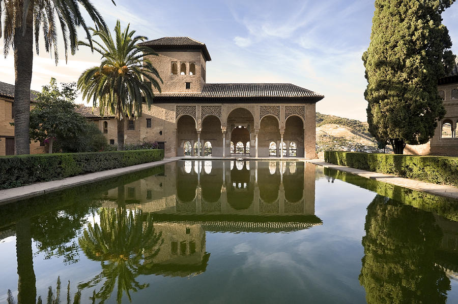 Alhambra Palace with perfect reflection in Granada, Spain Photograph by Jonathansloane