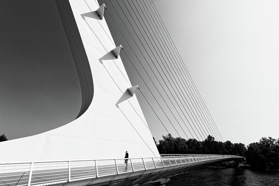 Almost Over -- Woman Walking Over Sundial Bridge in Redding, California Photograph by Darin Volpe
