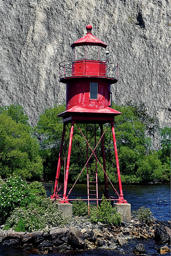 Alpena Light against the Rocks Photograph by Gregory Steele - Pixels