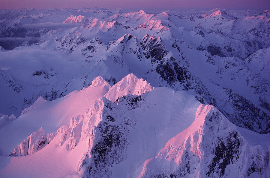 Alpenglow In The Cascade Mountains In Washington Photograph by Harald Sund