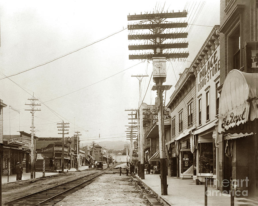 Alvarado Street Photograph -  Alvarado Street Shows the Royal Hotel, the Palace drug store 1905 by Monterey County Historical Society