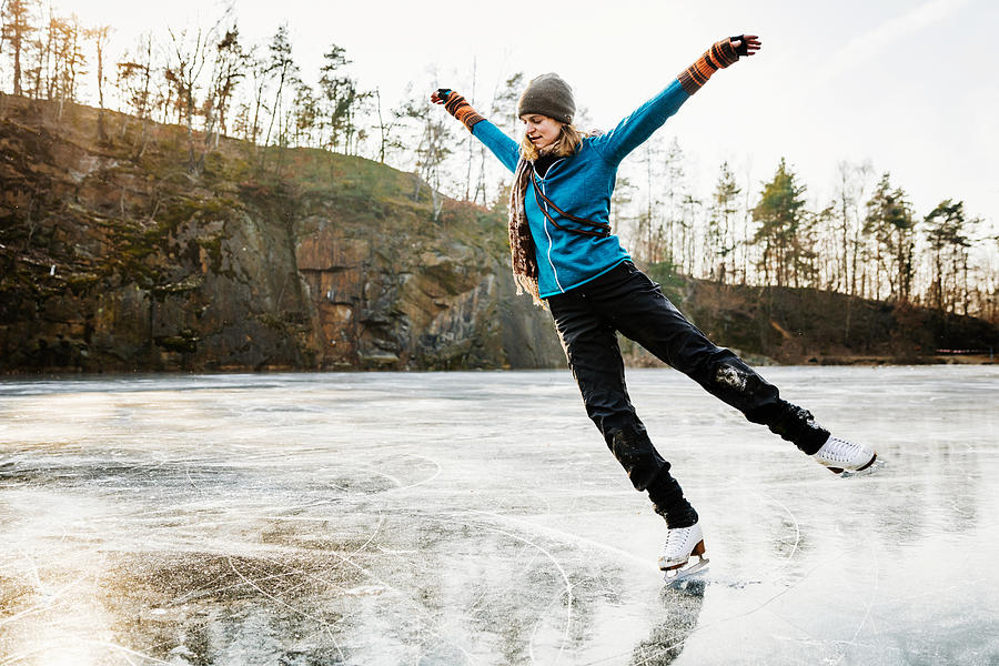 Amateur Ice Skater Posing On Frozen Lake Photograph by Tom Werner