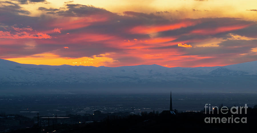Sunset Photograph - amazing sunset with beautiful clouds and Armenian Genocide Memorial Complex by Arthur Vardanyan