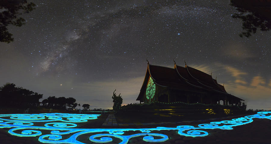 Amazing Wat Sirindhorn,stars  and milky way night sky temple in Northeast  Thailand . Photograph by Sarote Pruksachat