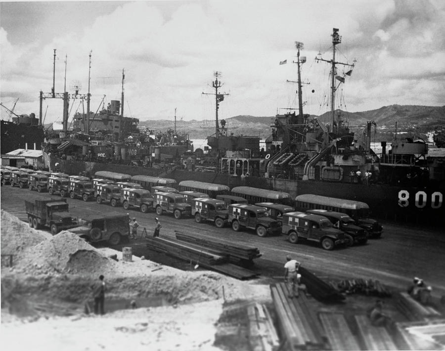 Ambulances are lined up in Guam awaiting the arrival of the USS ...