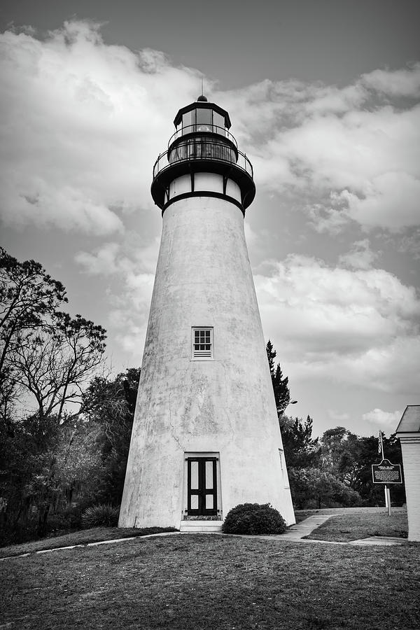 Amelia Island Lighthouse in the Clouds in Black and White Photograph by Debra and Dave Vanderlaan