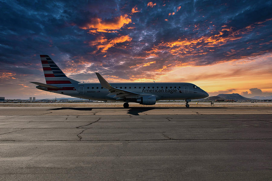 American Airlines Eagle Embraer E175LR taxies to the active runw Photograph by Chris Smith