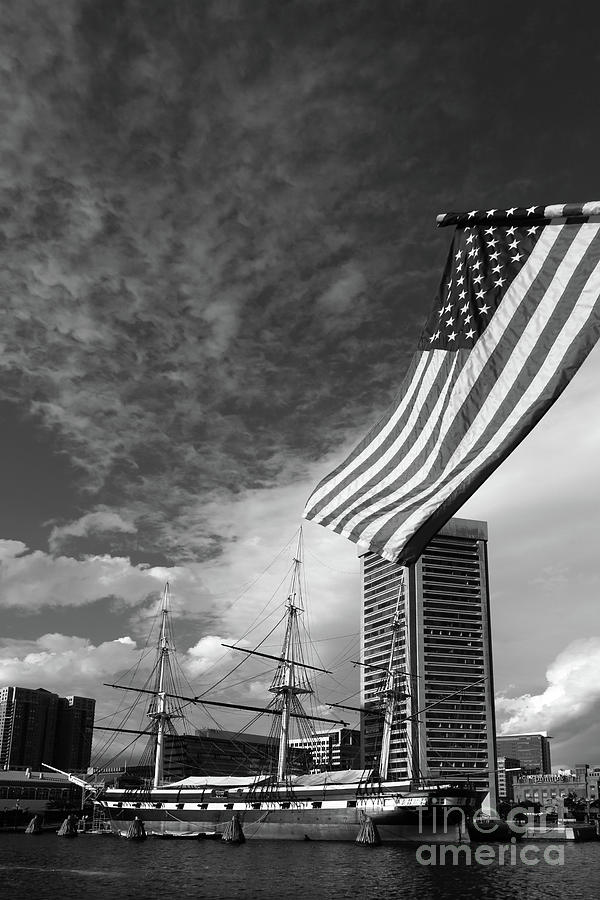 Baltimore Photograph - American Flag and Inner Harbor Baltimore by James Brunker