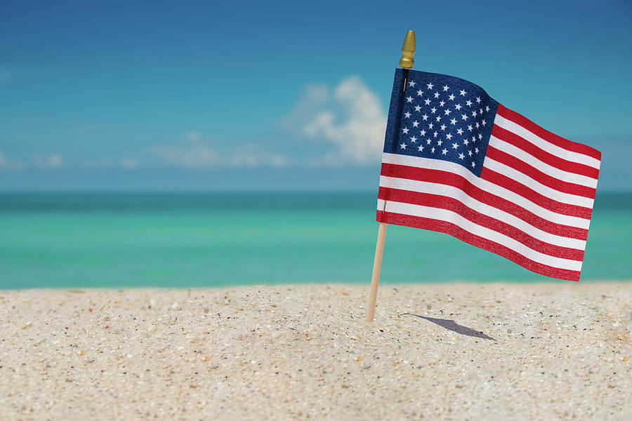American Flag on the Ocean Beach Photograph by Artiom Storojenco - Fine