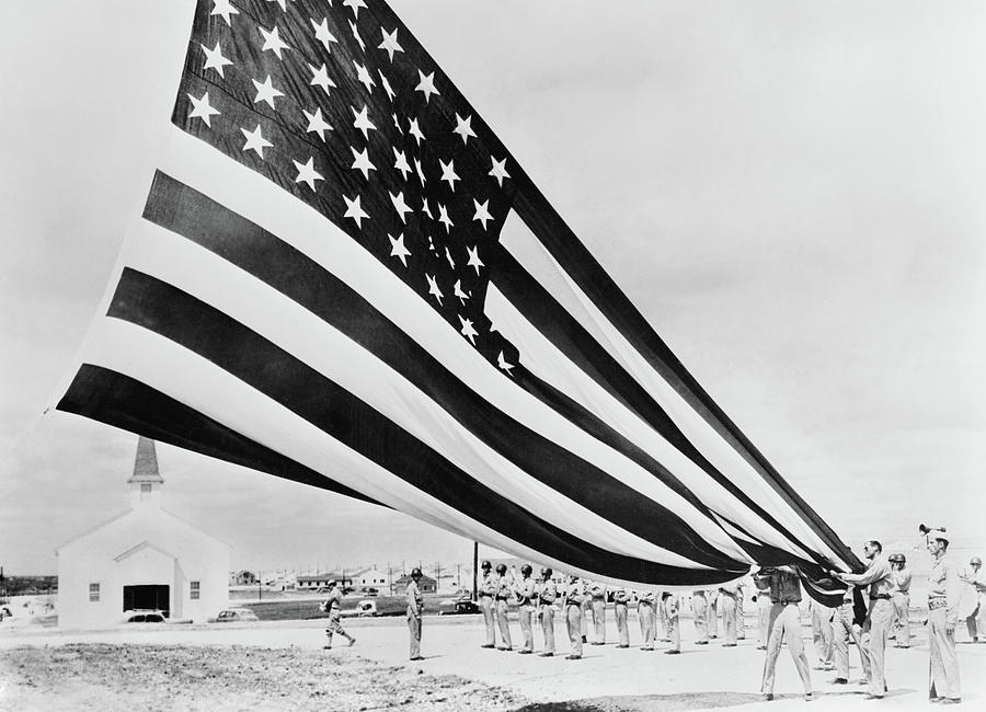 Americana - Fort Hood Texas - Unfolding the flag 1944 - BW ALT CROP Photograph by Mike Savad