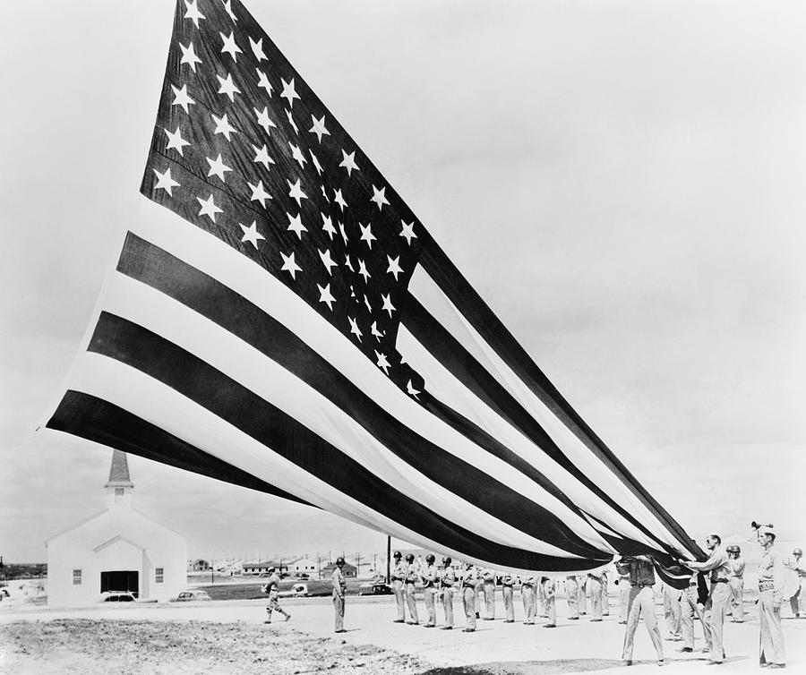 Americana - Fort Hood Texas - Unfolding the flag 1944 - Side by  Photograph by Mike Savad