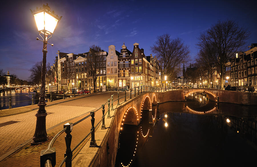 Amsterdam canals and typical canal houses at dusk Photograph by 1111iespdj