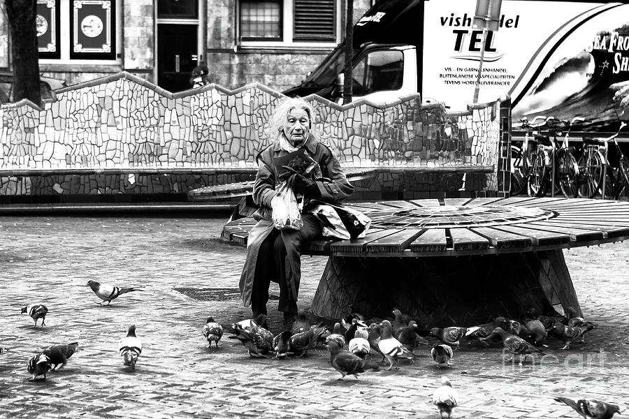 Amsterdam Feeding the Pigeons Photograph by John Rizzuto