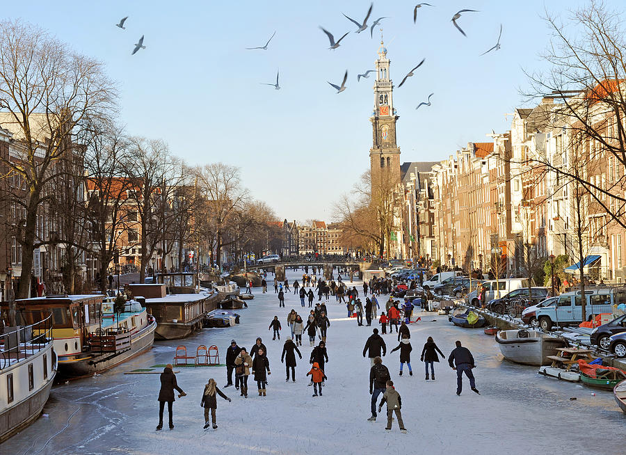 Amsterdam on ice Photograph by Oversnap