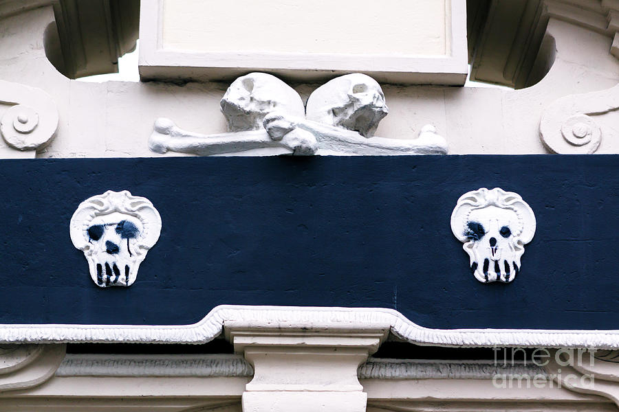 Amsterdam Skulls on the Wall Photograph by John Rizzuto