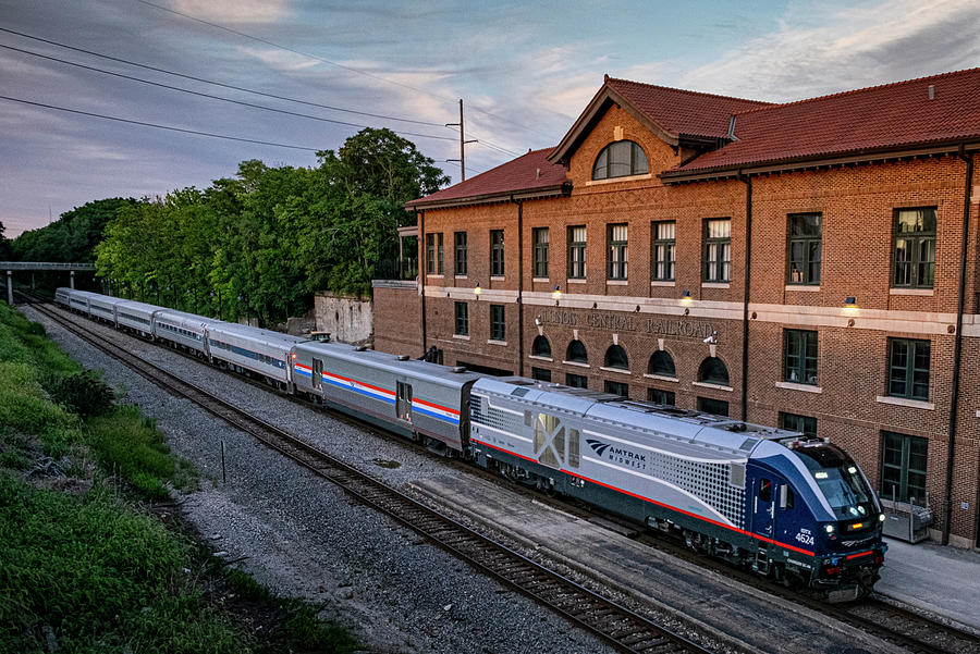 Amtrak 393 pulls into the old Illinois Central Depot in downtown Mattoon Illinois Photograph by Jim Pearson