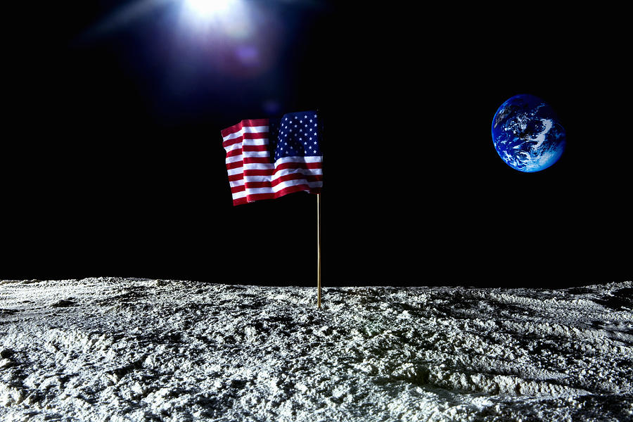 An American flag on the surface on the moon Photograph by Caspar Benson