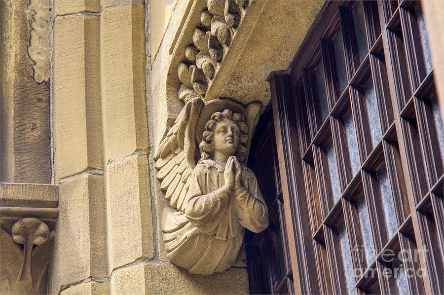 Lifestyle Photograph - An Angel carving on The Church of the Holy Name of Jesus on Oxford Road, Manchester, England. by Pics By Tony