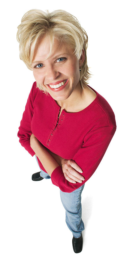 An Attractive Caucasian Blonde Woman In Jeans And A Red Shirt Smiles Up At The Camera Photograph by Photodisc