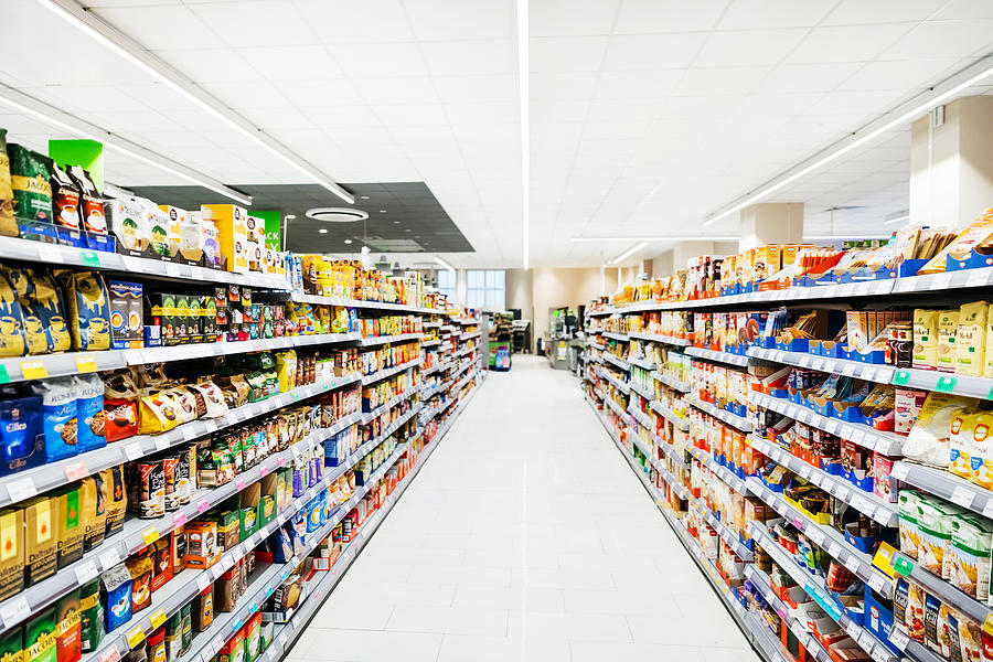 An Empty Supermarket Aisle Filled With Stock Photograph by Tom Werner