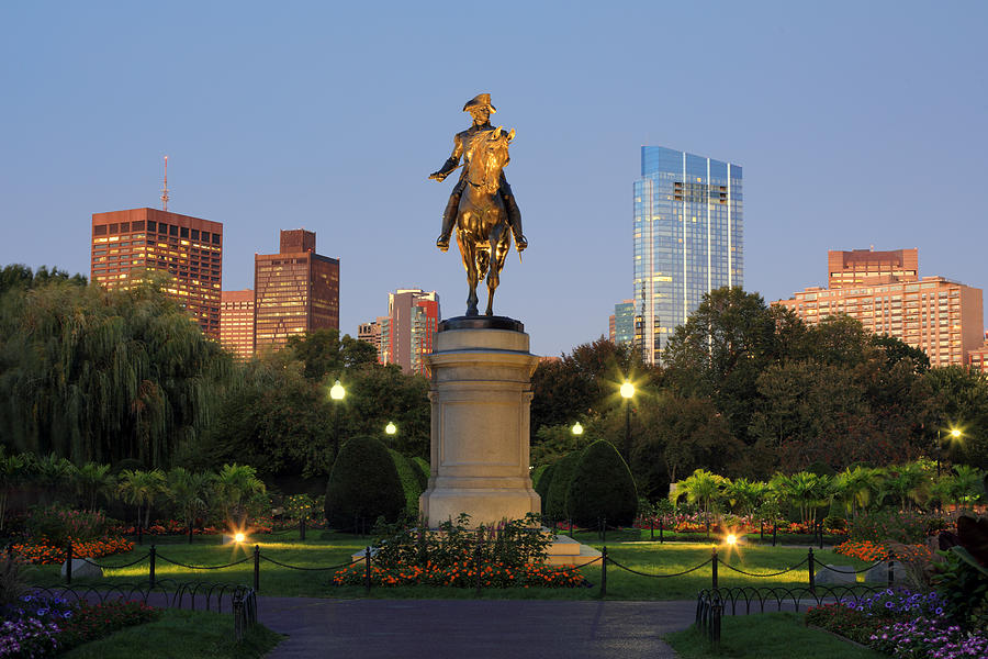 An equestrian statue of George Washington in Bostons Public Garden illuminated at dusk Photograph by Rainer Grosskopf