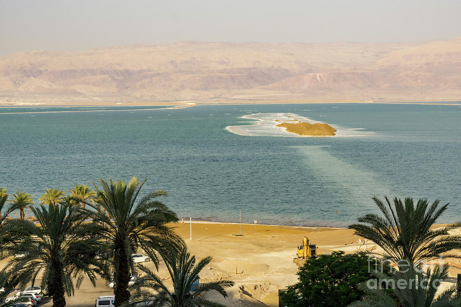 An island in the Dead Sea, as viewed from the Isrotel Dead Sea H Photograph by William Kuta