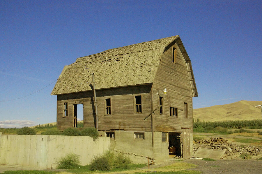 Barn Photograph - An old barn in an orchard by Jeff Swan