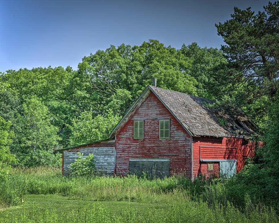An old red barn in central WIsconsin Photograph by Laura Hedien
