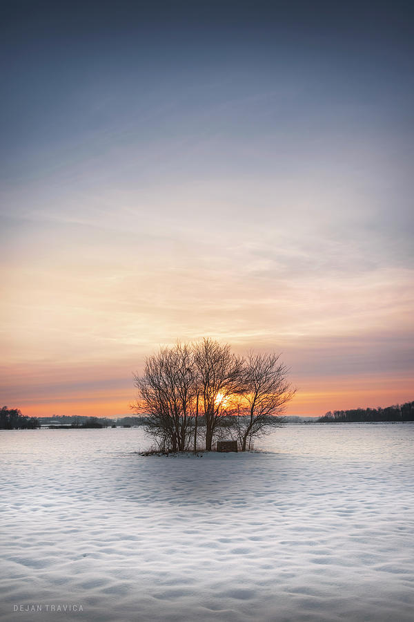 An old well in the middle of the winter field Photograph by Dejan Travica An old well in the middle of the winter field Photograph by Dejan Travica
