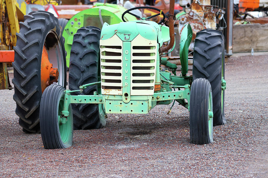 An Oliver tractor  from way back when Photograph by Jeff Swan