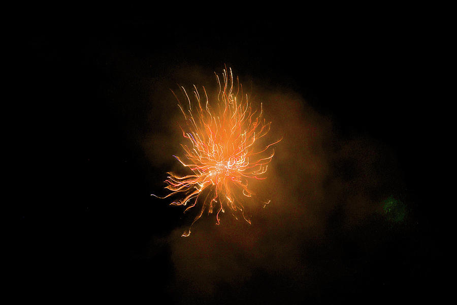 An Orange Streamer Firework Photograph
