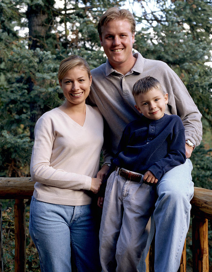 An Outdoor Portrait Of A Small Caucasian Family Photograph by Photodisc