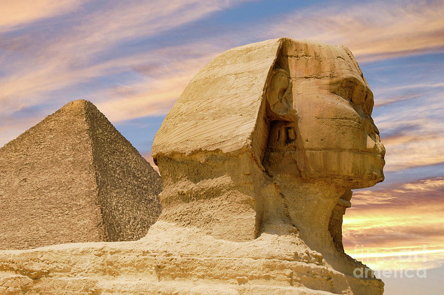 An up-close view of the Egyptian Sphinx at Giza, Egypt, which is set against a magnificent sunset Photograph by Gunther Allen