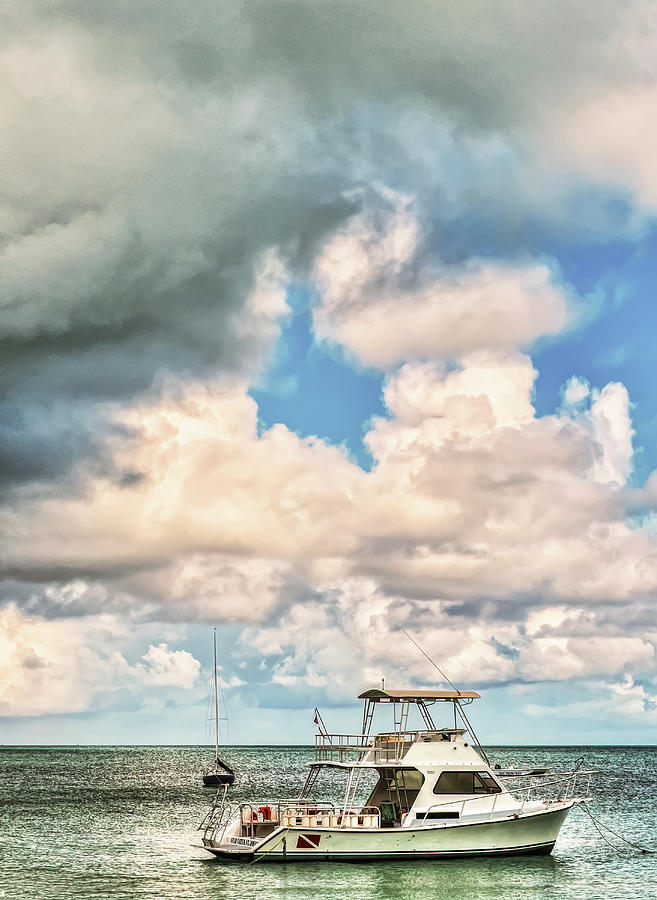 Anchored Boat And Incoming Storm Photograph by Gary Slawsky