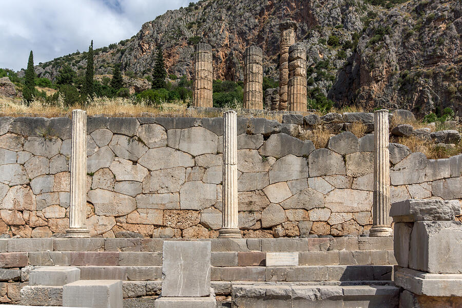 Ancient Columns in Greek archaeological site of Delphi, Greece Photograph by Sjhaytov