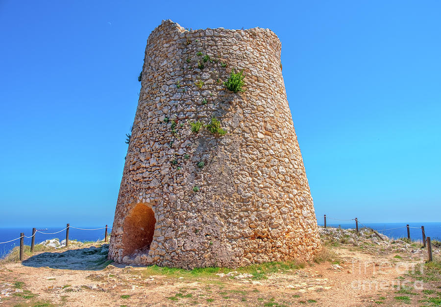ancient lookout tower stone watchtower of Sant Emiliano in Salento , Puglia region - Italy Photograph by Luca Lorenzelli