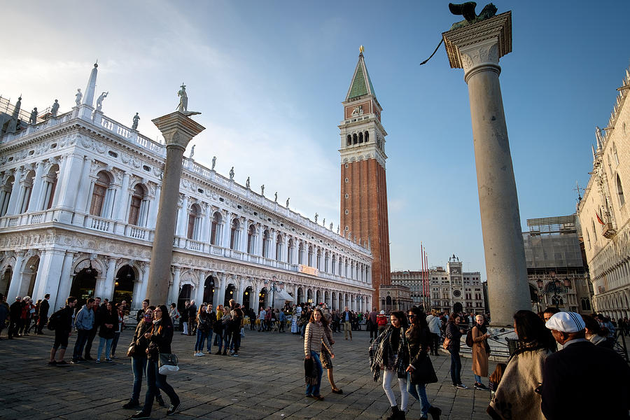 Ancient palace and tourists in Piazza San Marco in Venice Photograph by Cividins