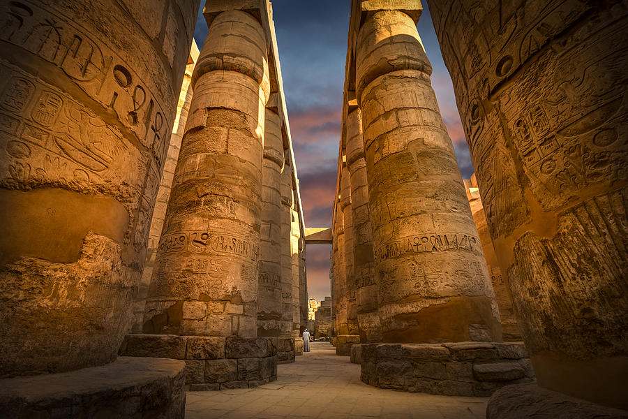 Ancient ruins of Karnak temple with colorful sky, Egypt Photograph by Gargolas