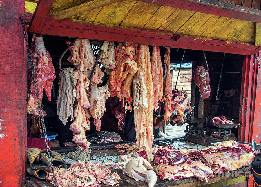 Butcher shop at Andasibe Photograph by Claudio Maioli
