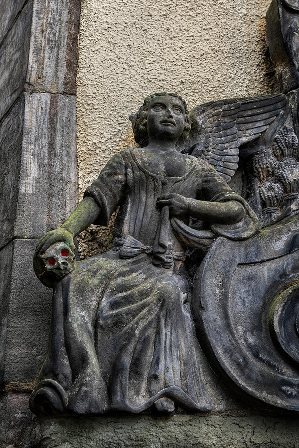 Angel With Skull In Greyfriars Kirkyard In Edinburgh Photograph by Artur Bogacki
