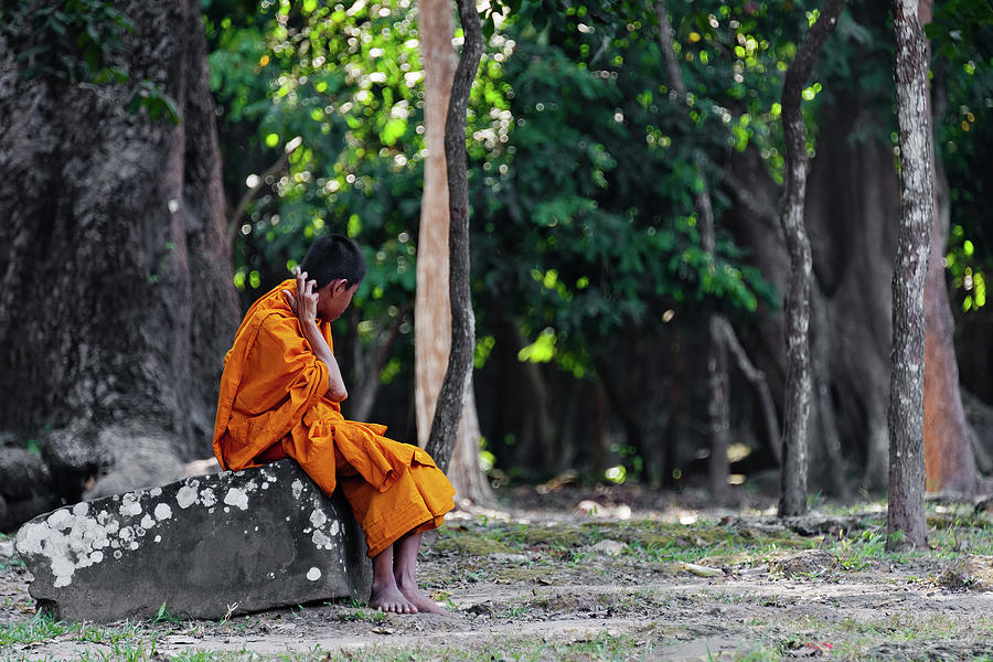 Angkor wats little monk. Cambodia  Photograph by Lie Yim