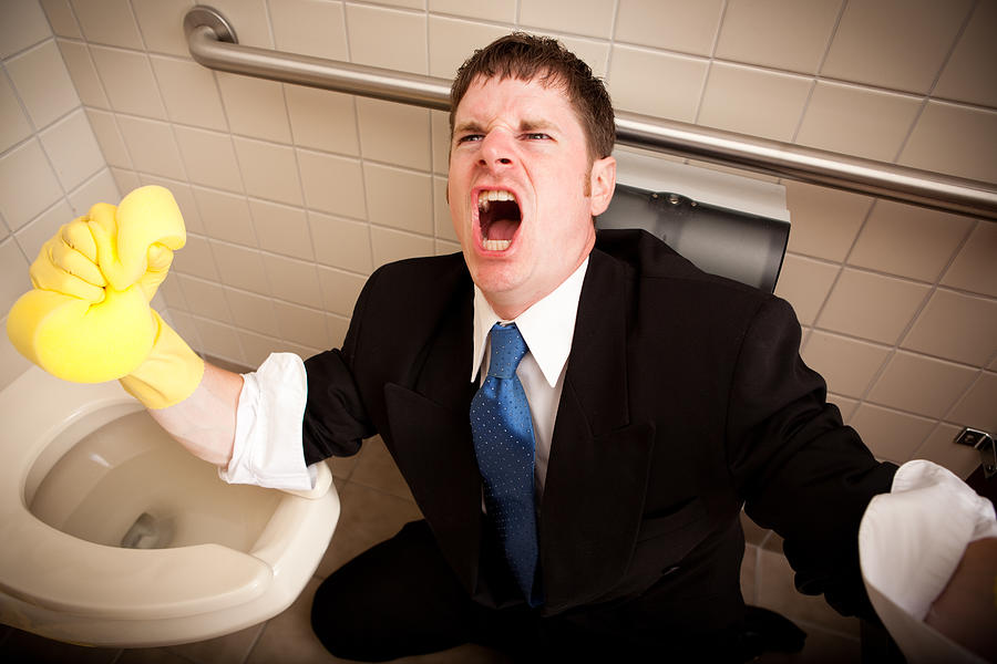 Angry, Screaming Businessman Cleaning the Restroom Toilet Photograph by Ideabug