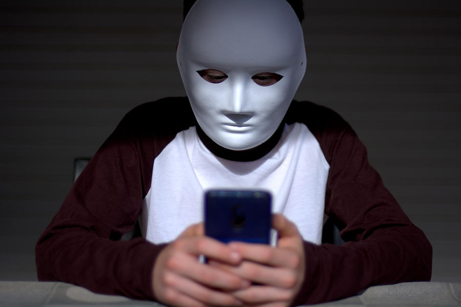 Anonymous cyberbullying Photograph by Miguel Sotomayor