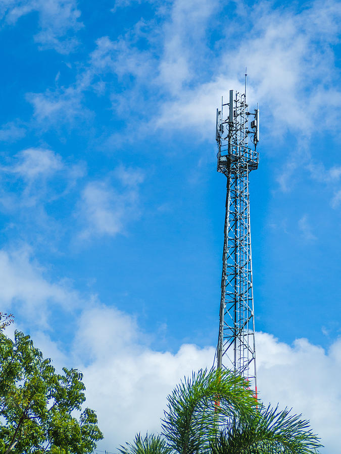 Antenna tower with the blue sky background Photograph by DaddyOhm