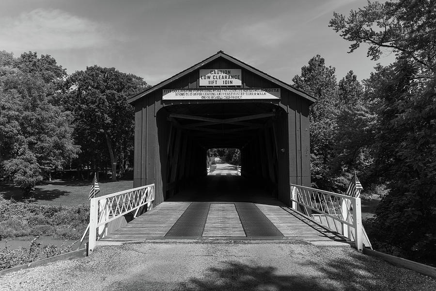 Antique and historic Red Covered Bridge in Princeton Illinois in black and white Photograph by Eldon McGraw