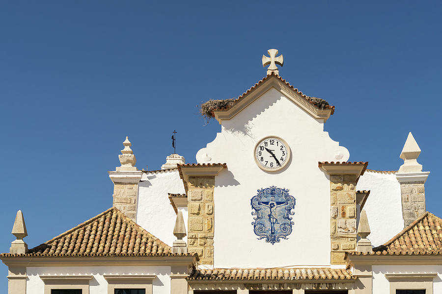 Antique Portuguese Azulejos - Crucifix Medallion on a Church in Olhao Algarve Portugal Photograph by Georgia Mizuleva