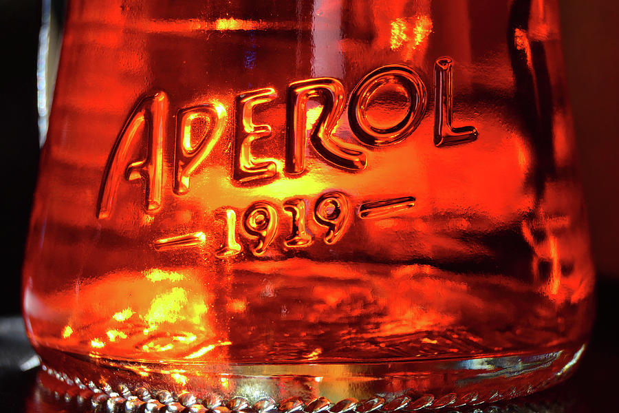 Aperol Aperitif Glass Bottle Sunlit Macro Photograph by Shawn OBrien